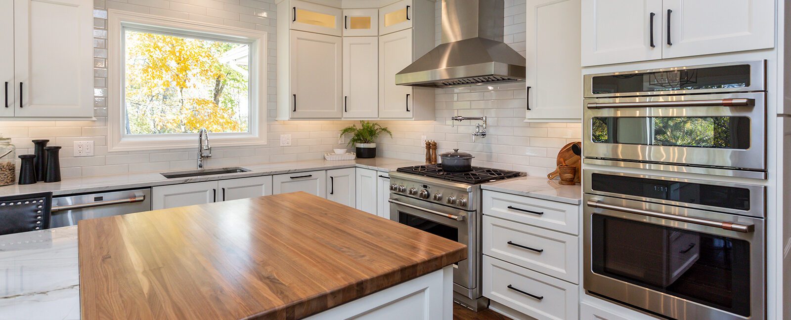 A kitchen with a wooden countertop