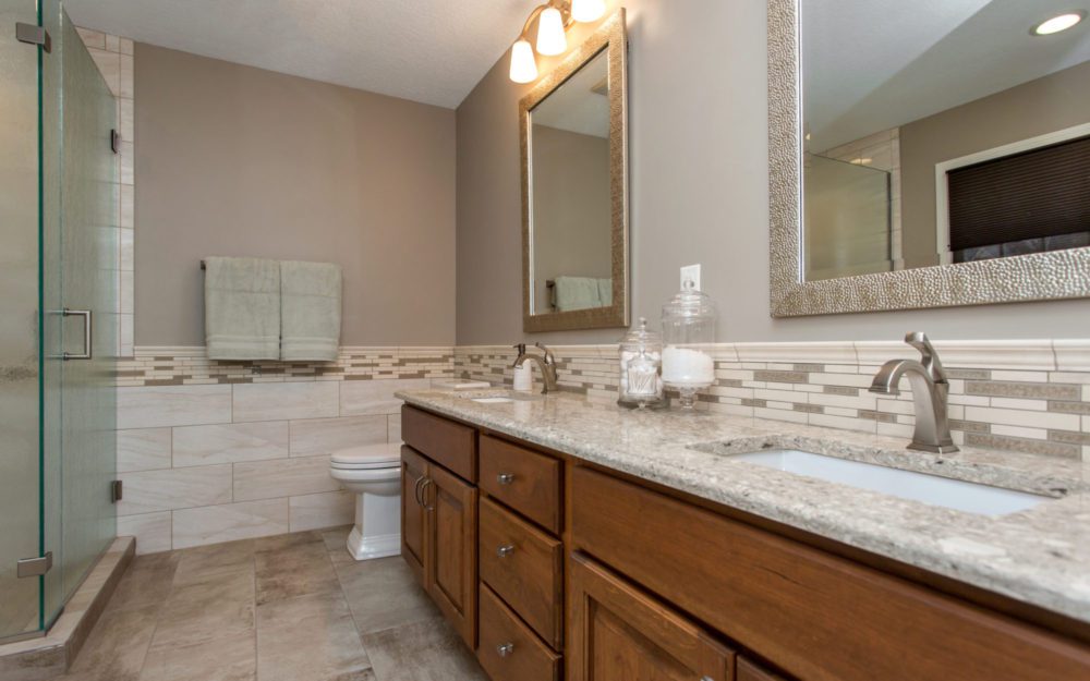 Countertops of the bathroom with two mirrors