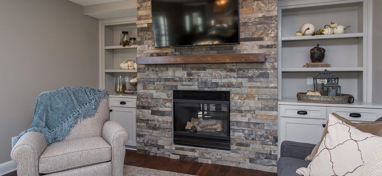 A fireplace area in a living room